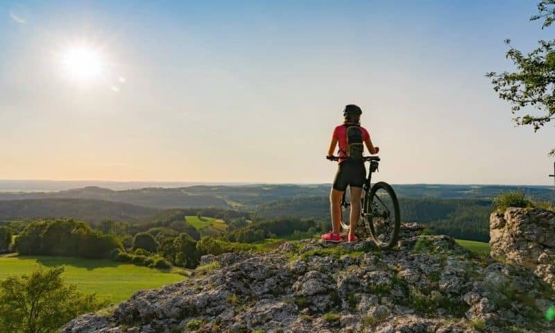 young woman admiring the awesome view over Frankonian Switzerlan